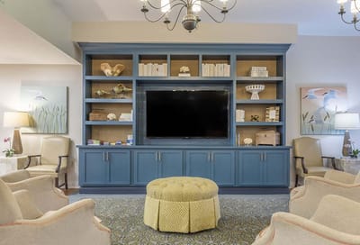 Common area with seating and a television.
