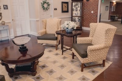 Cozy seating area with floral decor in the facility