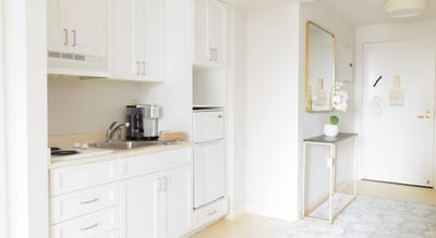 Bright resident kitchen area with modern decor