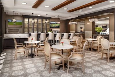 Elegant dining area with circular tables and light decor