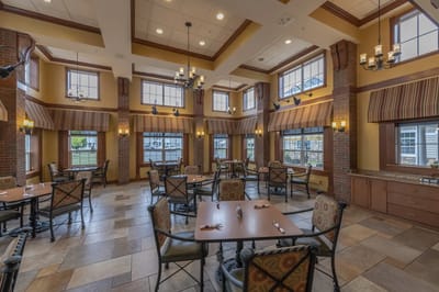 Bright dining room with tables and chairs