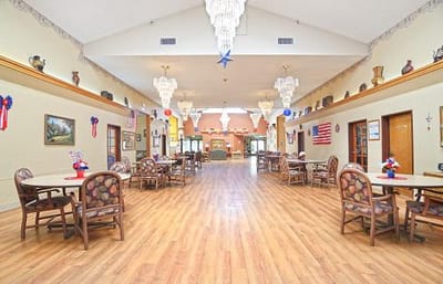 Bright common area with tables and decorations