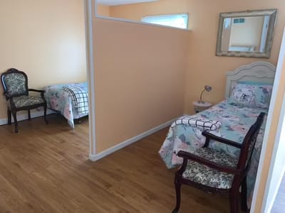 Interior view of a shared resident room with two beds