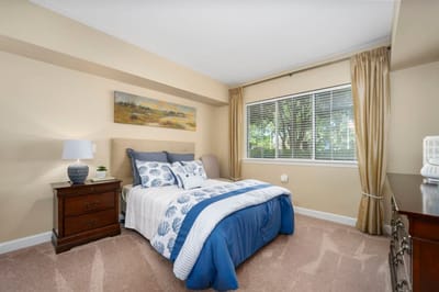 Cozy resident bedroom with natural light