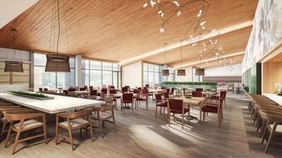 Modern dining area with wooden decor and seating