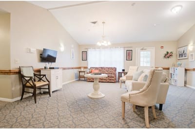 Common area with seating and television