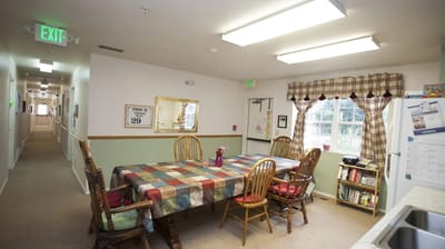 Dining area with a large table and chairs