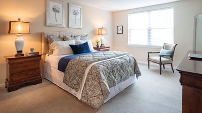 Cozy private resident room with bedding and decor