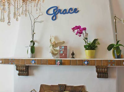Decorative interior space with plants and wall decor
