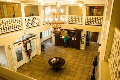Interior view of a common area with a reception desk