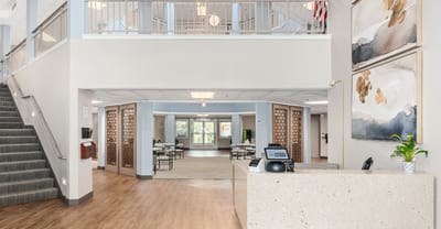 Interior view of the facility's common area with seating and decor