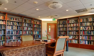 Interior of a library with bookshelves and seating