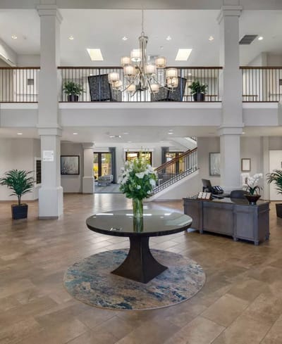 Interior view of the facility lobby with floral arrangement