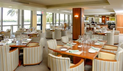 Elegant dining room setup in a senior living facility