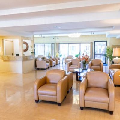 Bright common area with seating and welcoming decor