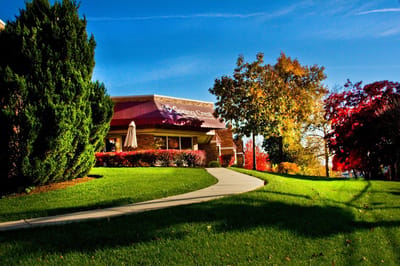 Exterior view of Spang Crest with lush landscaping