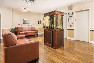 Interior common area with a fish tank and seating