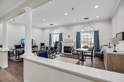 Common area with seating and a fireplace