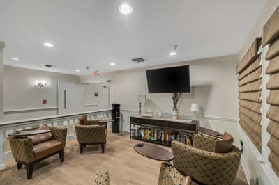 Comfortable lounge area with seating and a TV