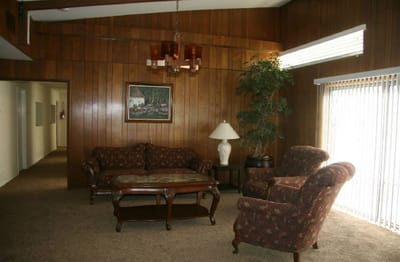 Cozy common area with furniture and plants