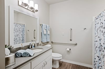 Well-lit bathroom with modern fixtures