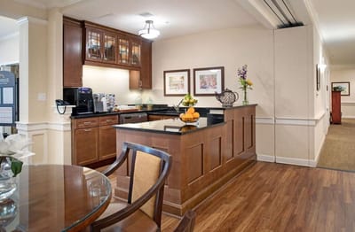Cozy common area kitchen with wooden finishes
