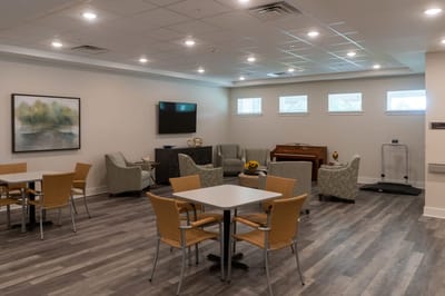 Common area with seating and a piano