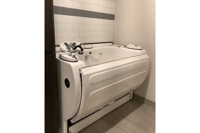 Hydrotherapy tub in a clean, modern facility
