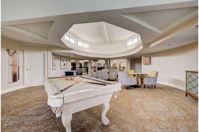 Interior view of a common area with a pool table