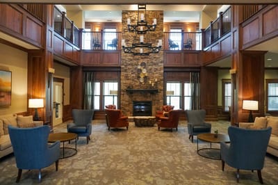 Interior view of a cozy common area with seating