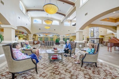 Residents socializing in a spacious common area