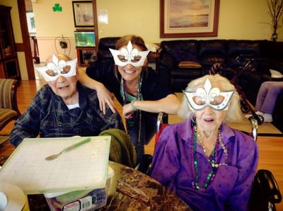 Residents enjoying a festive activity with masks
