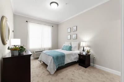 Cozy private bedroom in a senior living facility