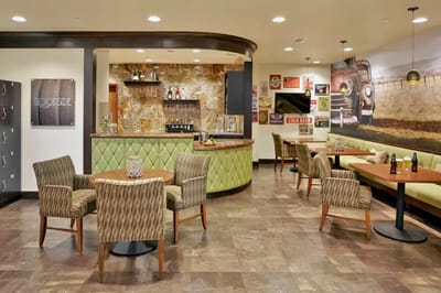 Common area with seating and bar setup.