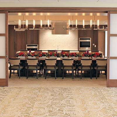 Modern dining area with decorated table and chairs