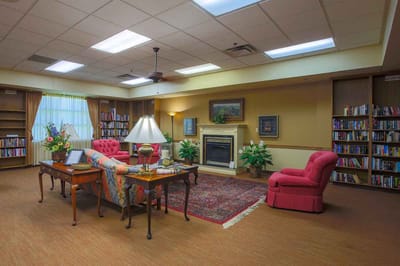 Cozy common area with bookshelves and seating