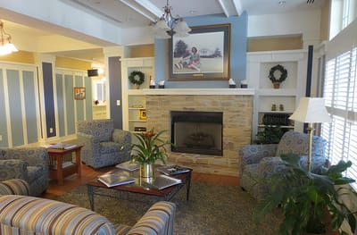 Cozy common area with seating and a fireplace
