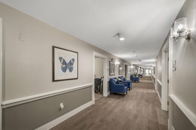 Interior hallway with seating and art decor