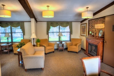 Cozy interior lounge area with seating and natural light