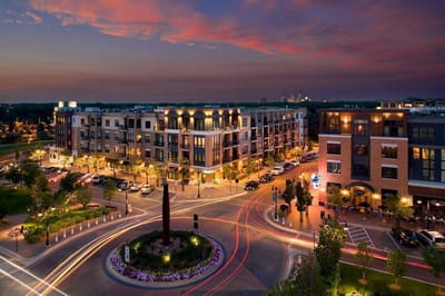 Aerial view of Excelsior & Grand Apartments at sunset