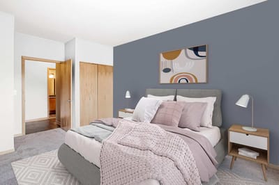 Stylish interior of a private room with bedding and decor
