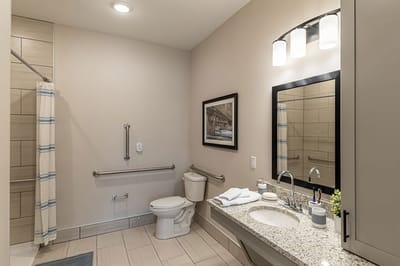 Modern assisted living bathroom with accessibility features