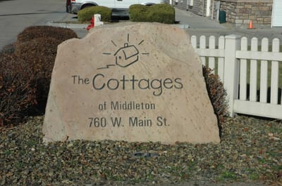 Sign for The Cottages of Middleton at the entrance