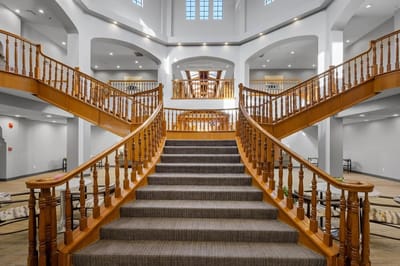 Elegant interior staircase in a senior living community