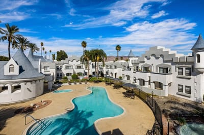 Aerial view of Camelot senior living community with pool.