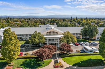 Aerial view of the facility building and surrounding landscape