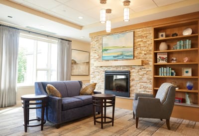 Inviting lounge area with comfortable seating and artwork