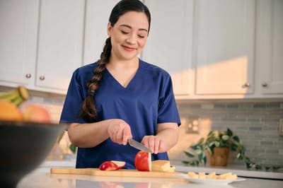 Staff member preparing food in the kitchen