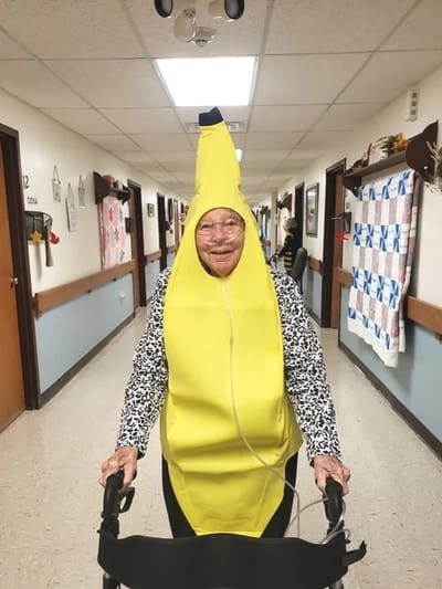 Resident dressed as a banana in the hallway