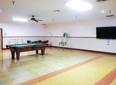 Interior view of a common area with a pool table